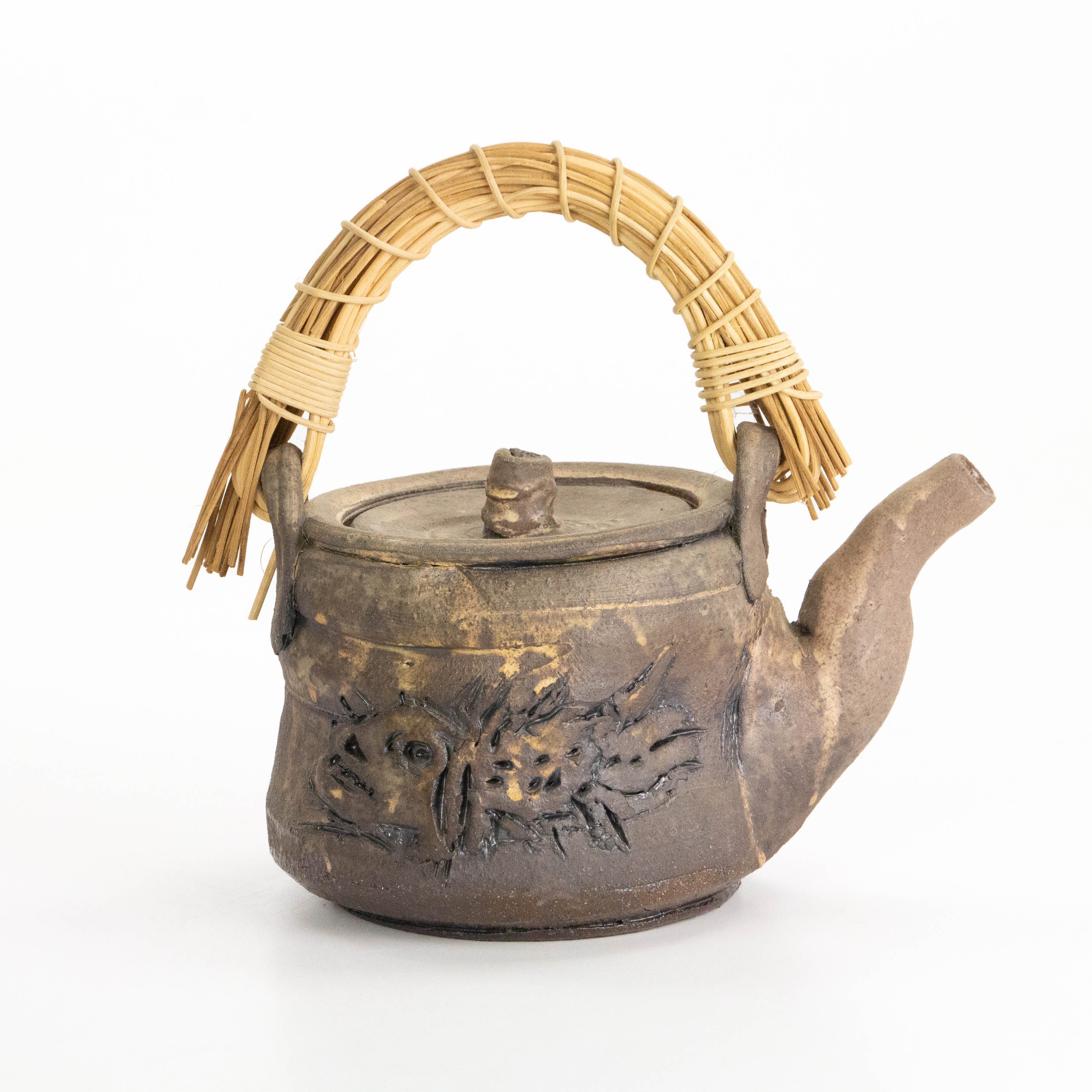 Teapot with Woven Handle, Carved Fish